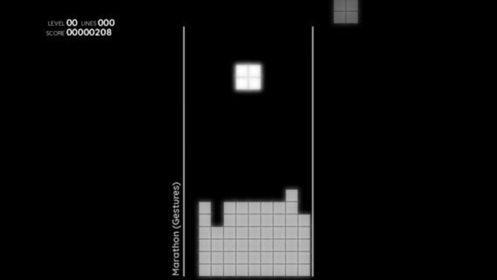 One of the many Tetris games, Falling Lightblocks, a black and grey minimalist version of Tetris.