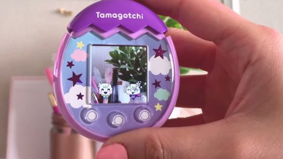 Promo art of a Tamagotchi Pix screen with characters looking happy