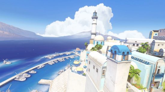 Une Carte Overwatch 2 Montrant Une Scène D'une Île Grecque Avec Des Bâtiments Blancs Denses Et Une Longue Mer Bleue Au Loin.
