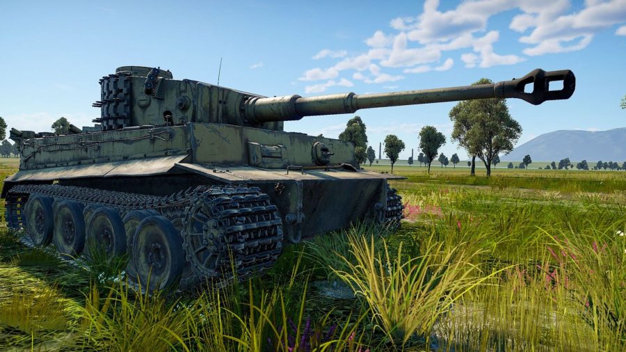 War Thunder codes header showing a tank on some grass with trees in the distance and some spotty clouds in a blue sky above.