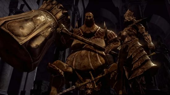 Dark Souls bosses: Ornstein and Smough stood together holding their weapons