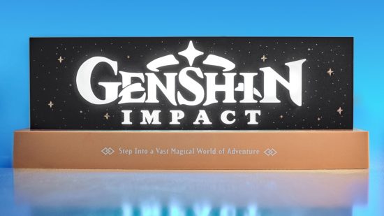 Genshin Impact merch: A high-quality image of the Genshin Neamedia logo light on a blue background