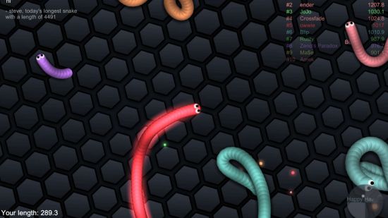 Best browser games: A screenshot from Slither showing snakes in front of a dark screen