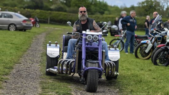 Camera quality example image for Huawei Pura 70 Ultra review showing a biker with a long beard on a three-wheeled cruiser