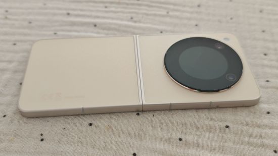 Custom image for Nubia Flip 5G review showing the phone unfolded and flat on a table