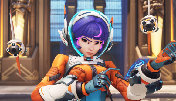 Overwatch 2 characters: Juno looking serious as she fires her pulsar torpedoes at the camera