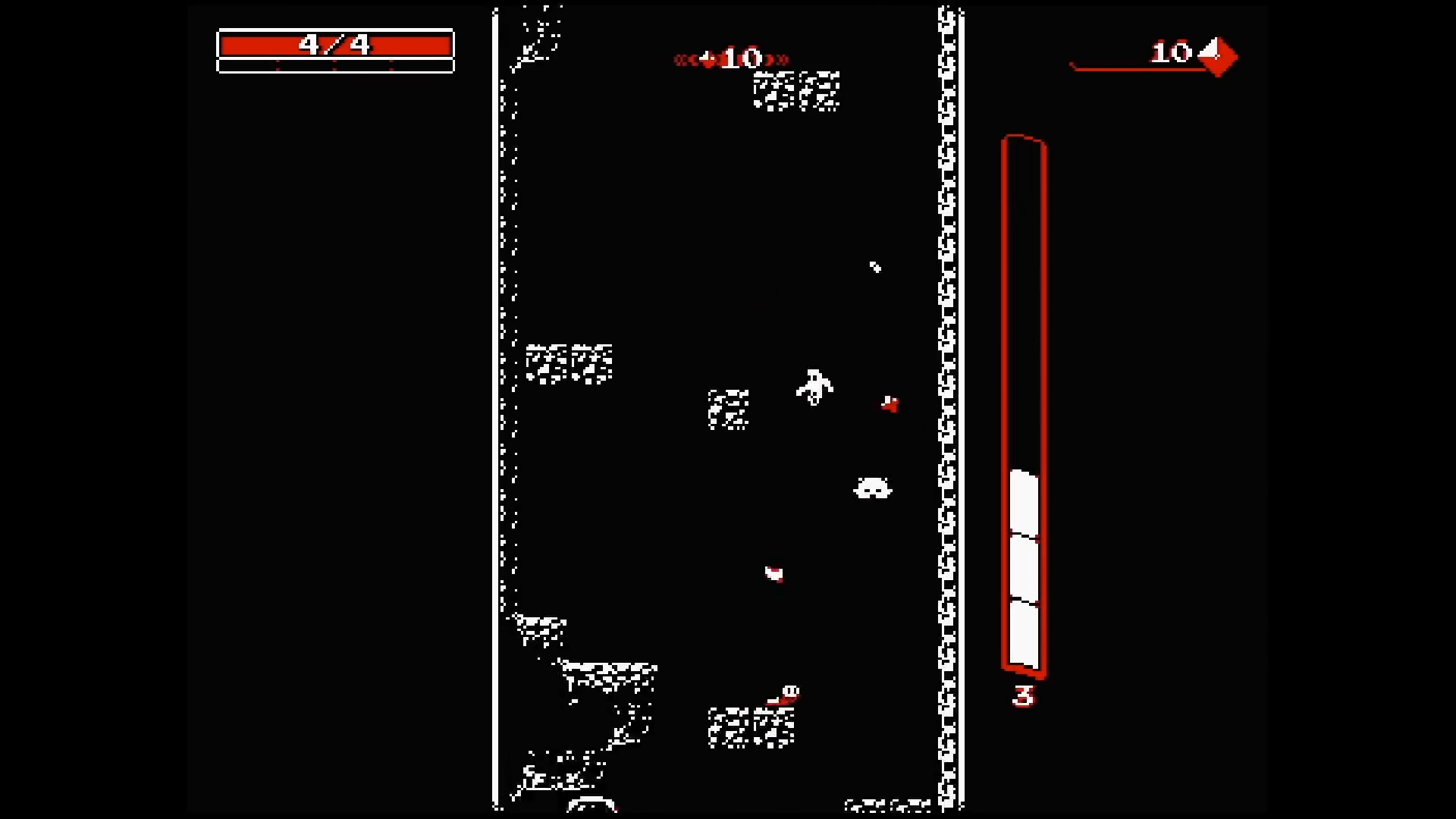 Best Android games: Downwell. Image shows someone descending into a well in this black and white mobile game.