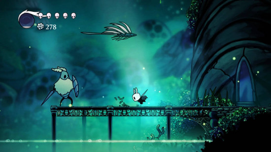 Best Nintendo Switch games: The Knight from Hollow Knight dashes across a green stage ready to attack with the nail