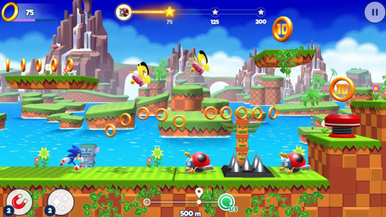 Sonic games: A screenshot from Sonic Runners Adventure of Sonic running through Green Hill Zone, about to encounter some robot birds, ladybugs, and some spike traps.