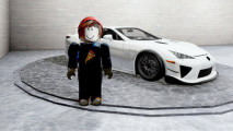 Highway Legends codes - an avatar in a dark pizza jumper and red beanie stood next to a white sports car