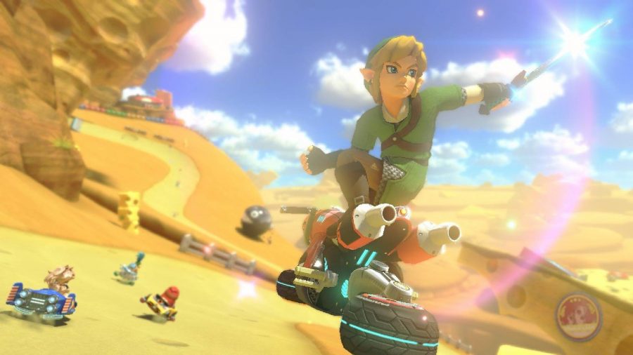 Link appears in Mario Kart, brandishing his sword at an opponent 