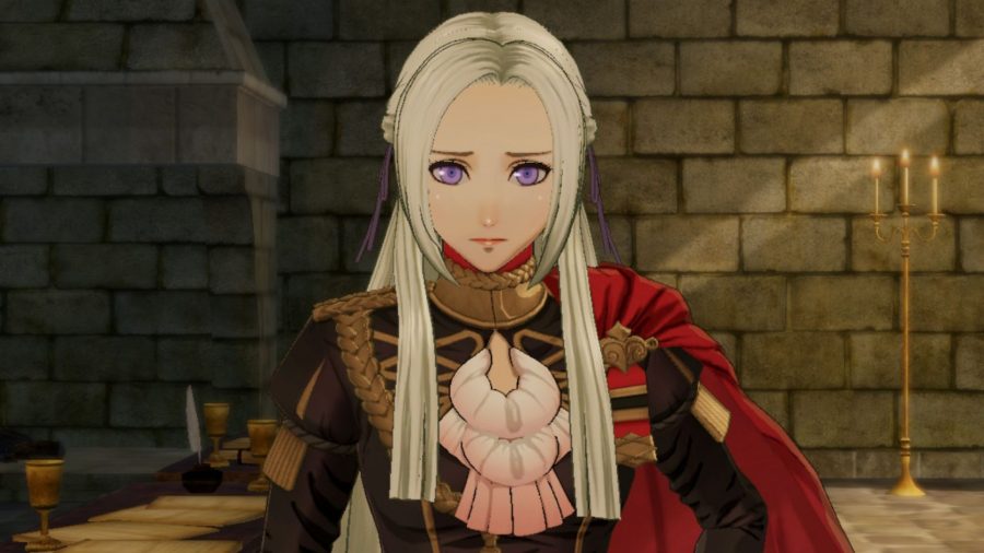 Edelgard looking worried, in a stone walled room, in Fire Emblem Warriors: Three Houses.